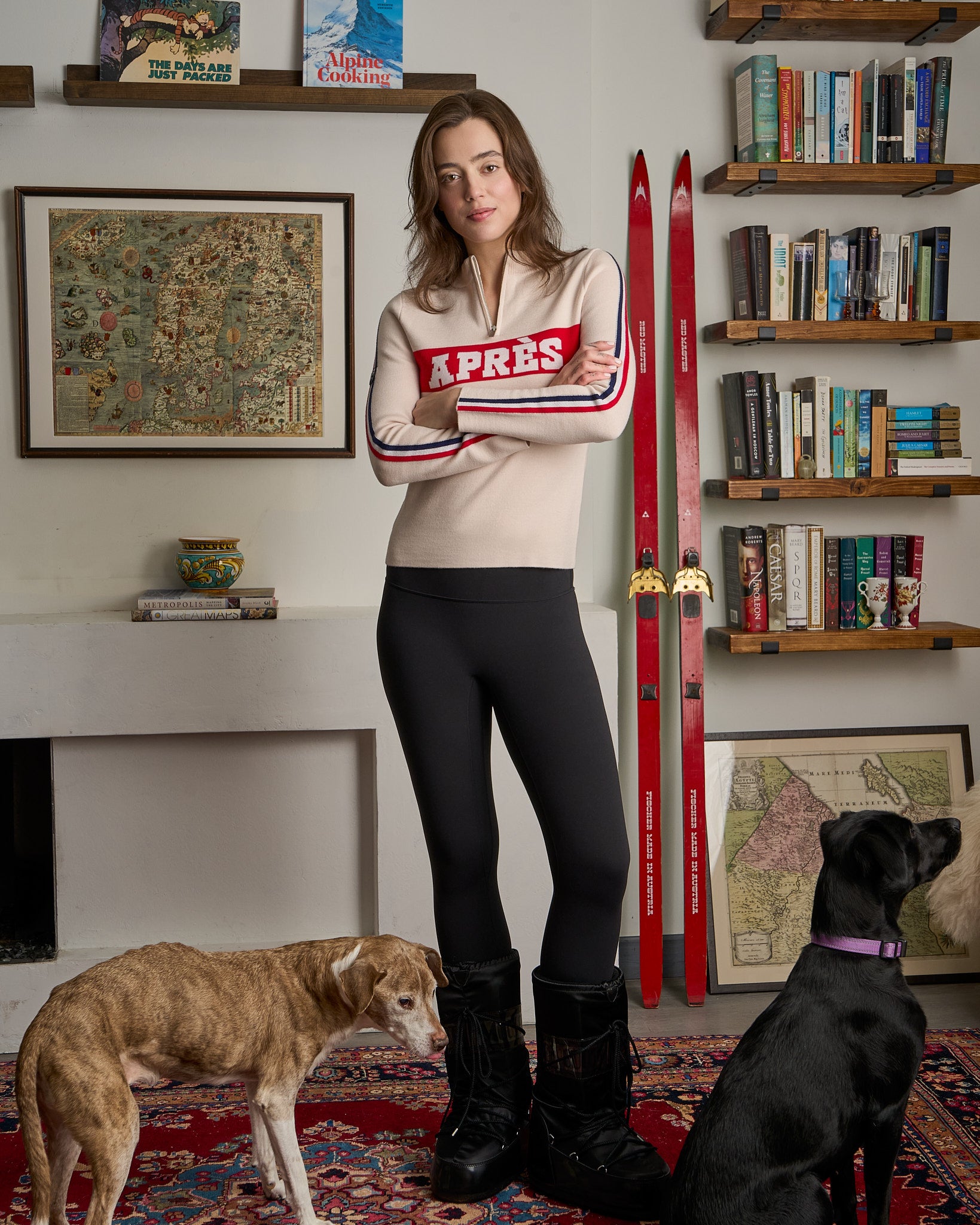 woman wearing preppy beige ski sweater with 'apres' written on it in merino wool