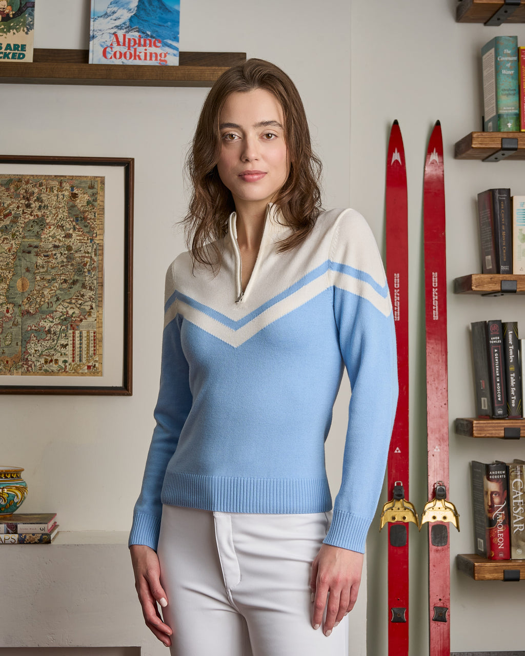 Woman wearing a blue and white chevron merino ski sweater