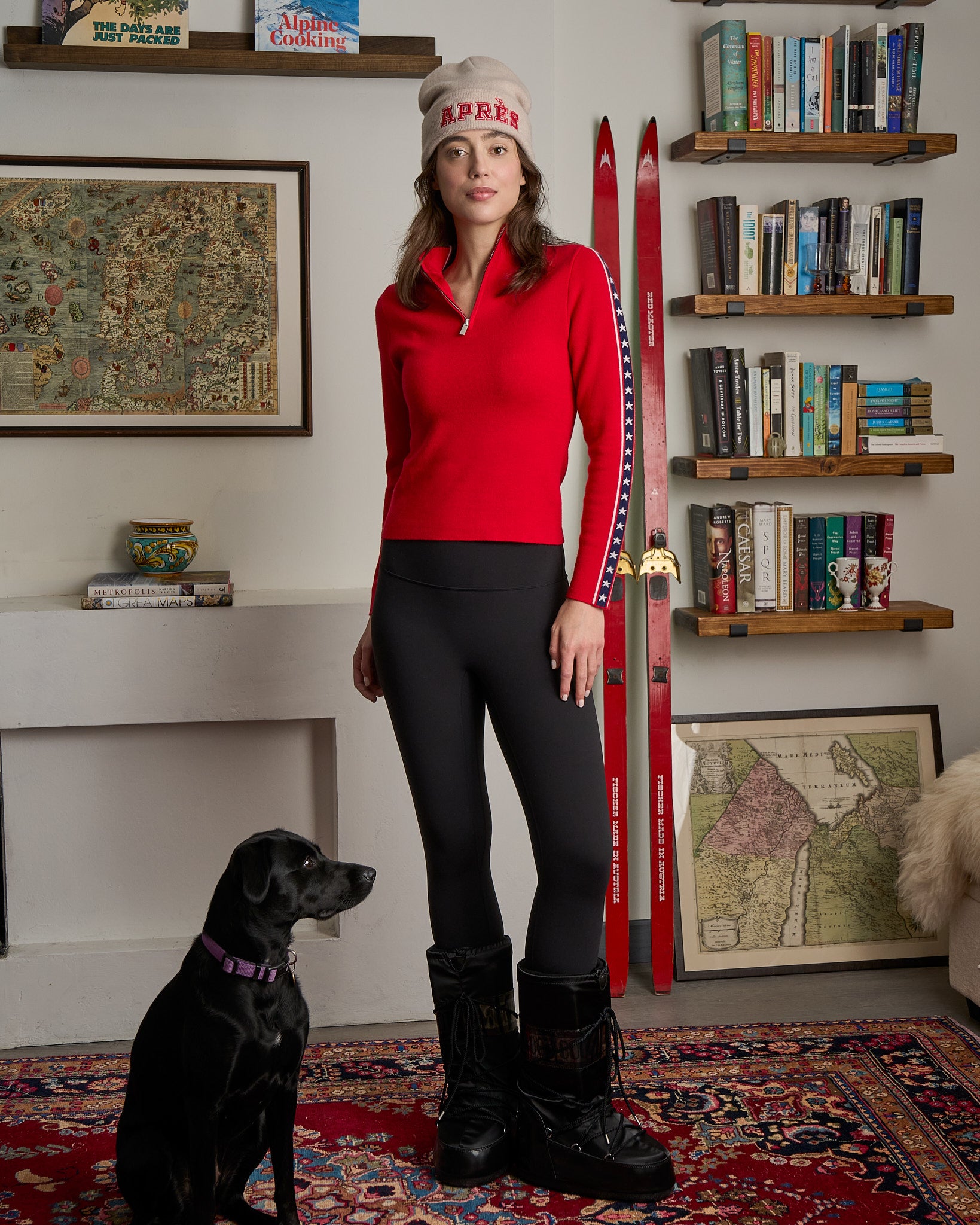 woman wearing red ski sweater in merino wool with stars and stripes on the sleeve